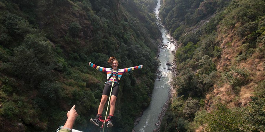 Top adventure destinations in Nepal featuring trekking, rafting, paragliding, mountain climbing, and scenic Himalayan landscapes
