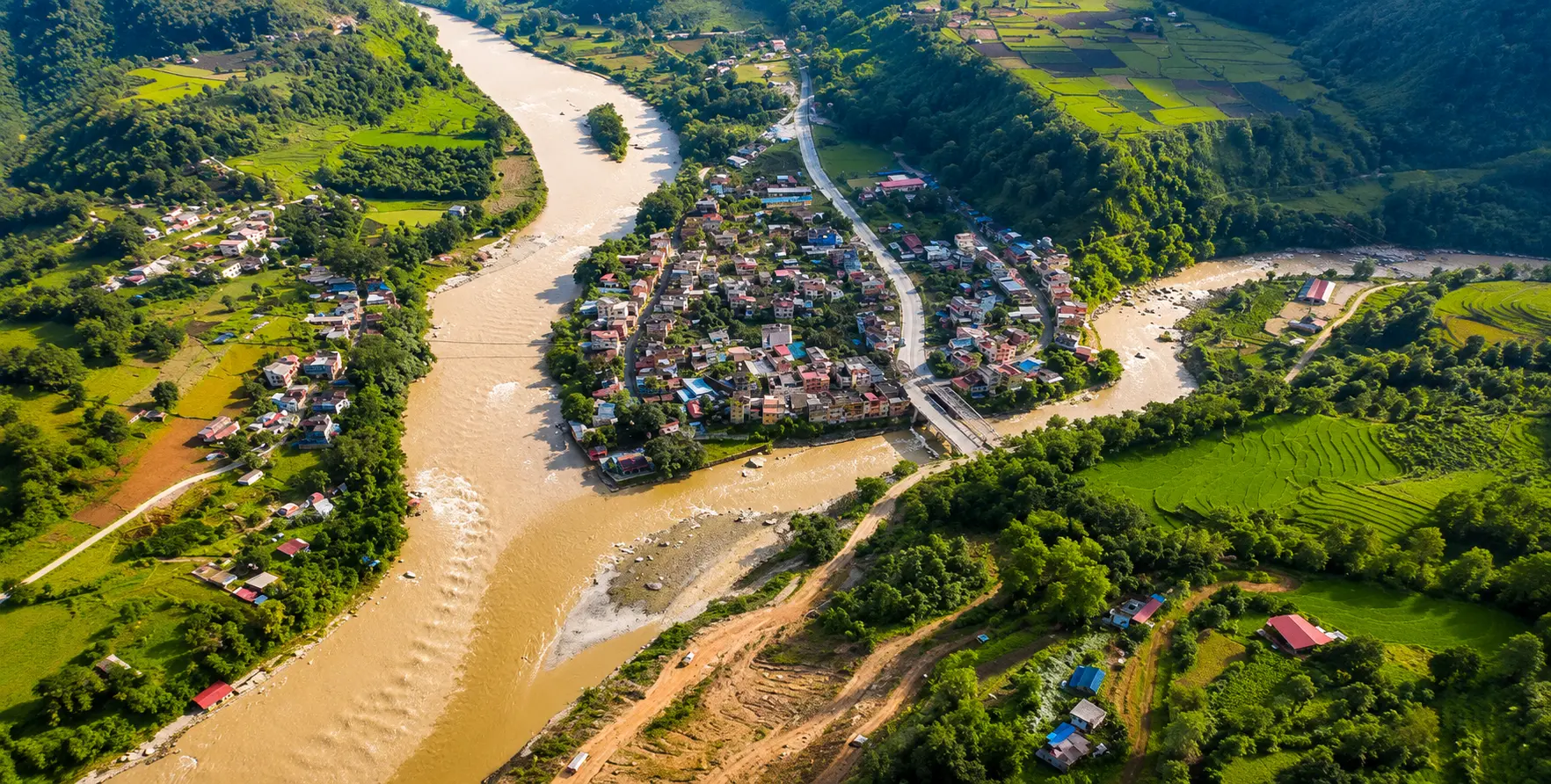The Trishuli River flowing through Nuwakot, Nepal, offering sacred pilgrimage sites, scenic landscapes, rafting, kayaking, and outdoor adventure.