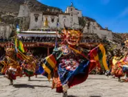Experience the Tiji Festival Upper Mustang in the ancient walled city of Lo Manthang, featuring traditional masked dances, Buddhist rituals, vibrant costumes, and centuries-old cultural traditions.