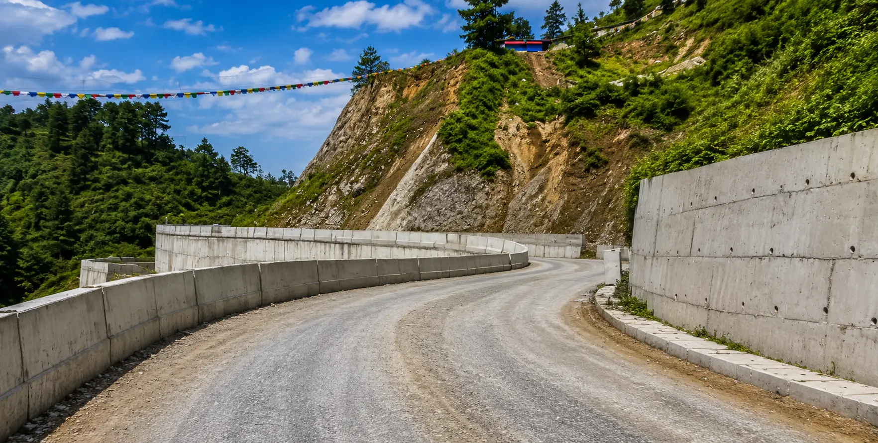Private 4WD jeep driving on the mountain road to the Everest Region with panoramic Himalayan scenery