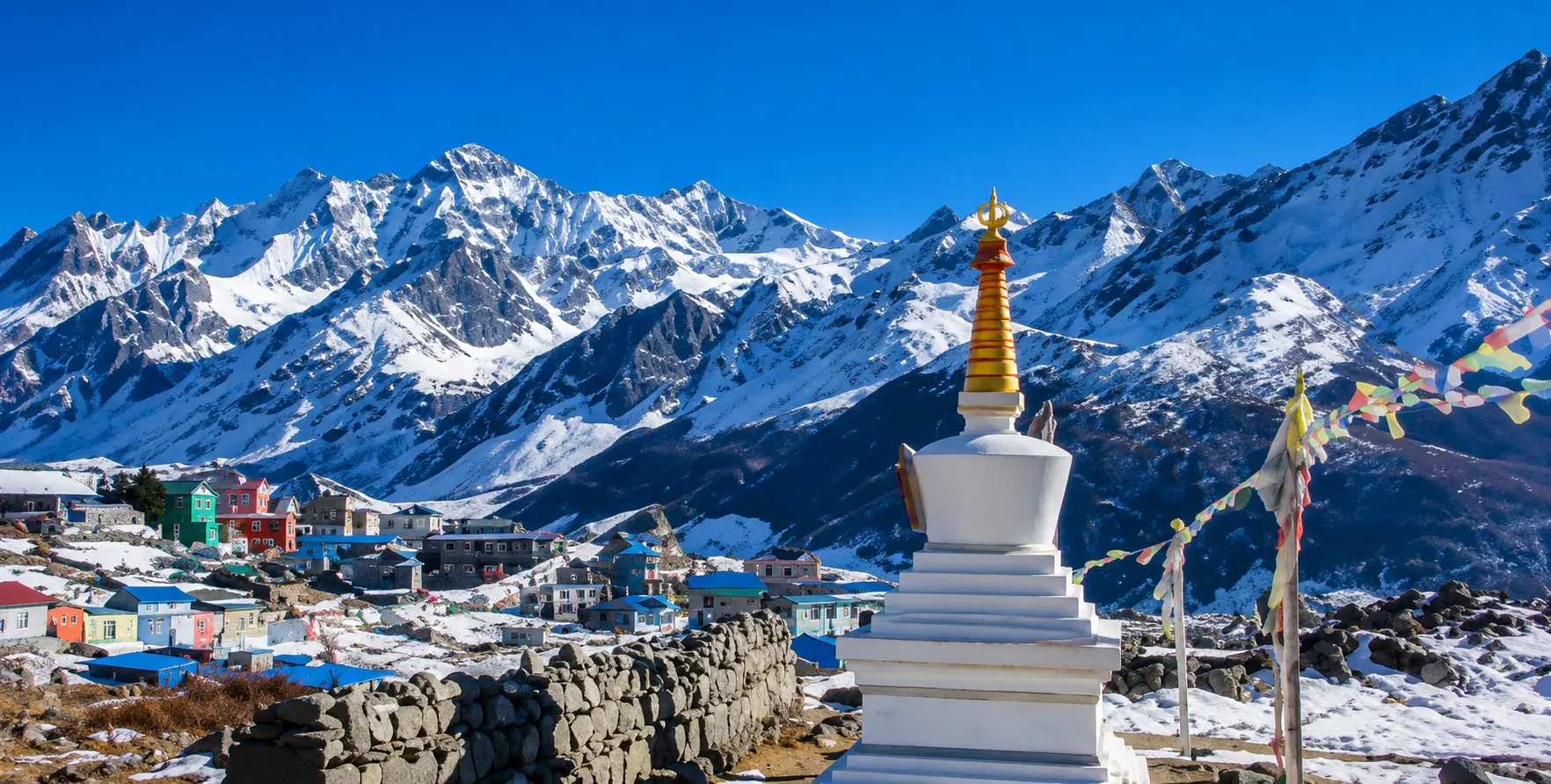 First-time trekkers hiking through the Himalayas with mountain views, preparing for their first Nepal trekking adventure