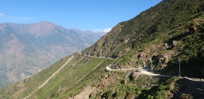 kathmandu-to-syabrubesi-road-overview Private 4WD jeep traveling on the Kathmandu to Syabrubesi road through the scenic Langtang region of Nepal