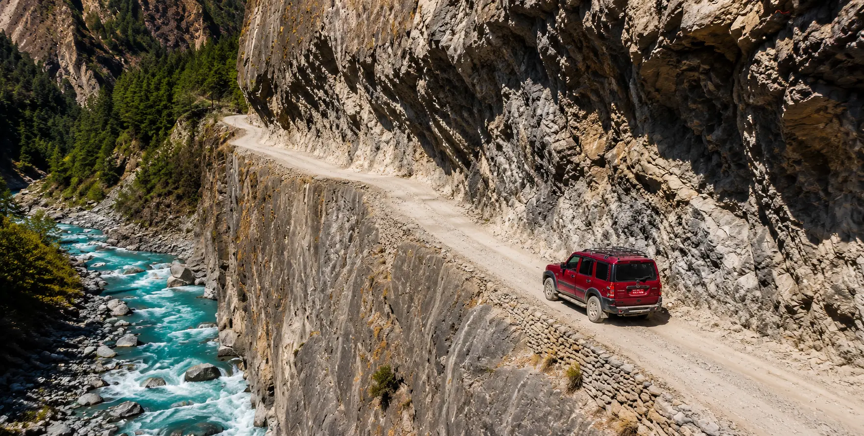 Private 4WD jeep driving on the Kathmandu to Manang road through Besisahar, Chame, and the Annapurna mountain landscape