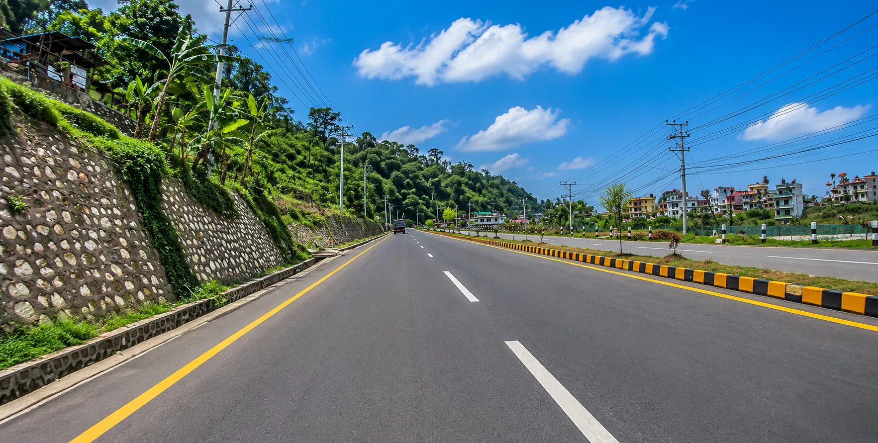 Kathmandu to Pokhara Road Condition | Prithvi Highway Nepal Kathmandu to Pokhara road conditions along the Prithvi Highway, with mountain scenery, rivers, and tourist vehicles in Nepal.